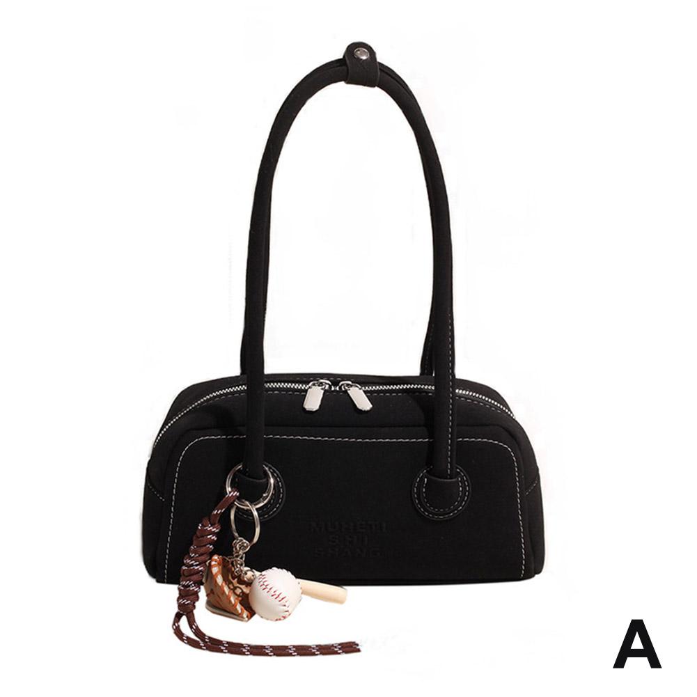 Bolso de bolos retro de alta gama para mujer, nuevo estilo de otoño, versátil bolso de hombro bajo el brazo, bolso de nicho para mujer.
