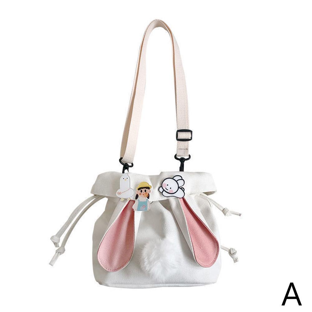 Bolso pequeño de lona para estudiantes de otoño, bonito bolso de hombro con cordón y colgante de color contrastante para dama.