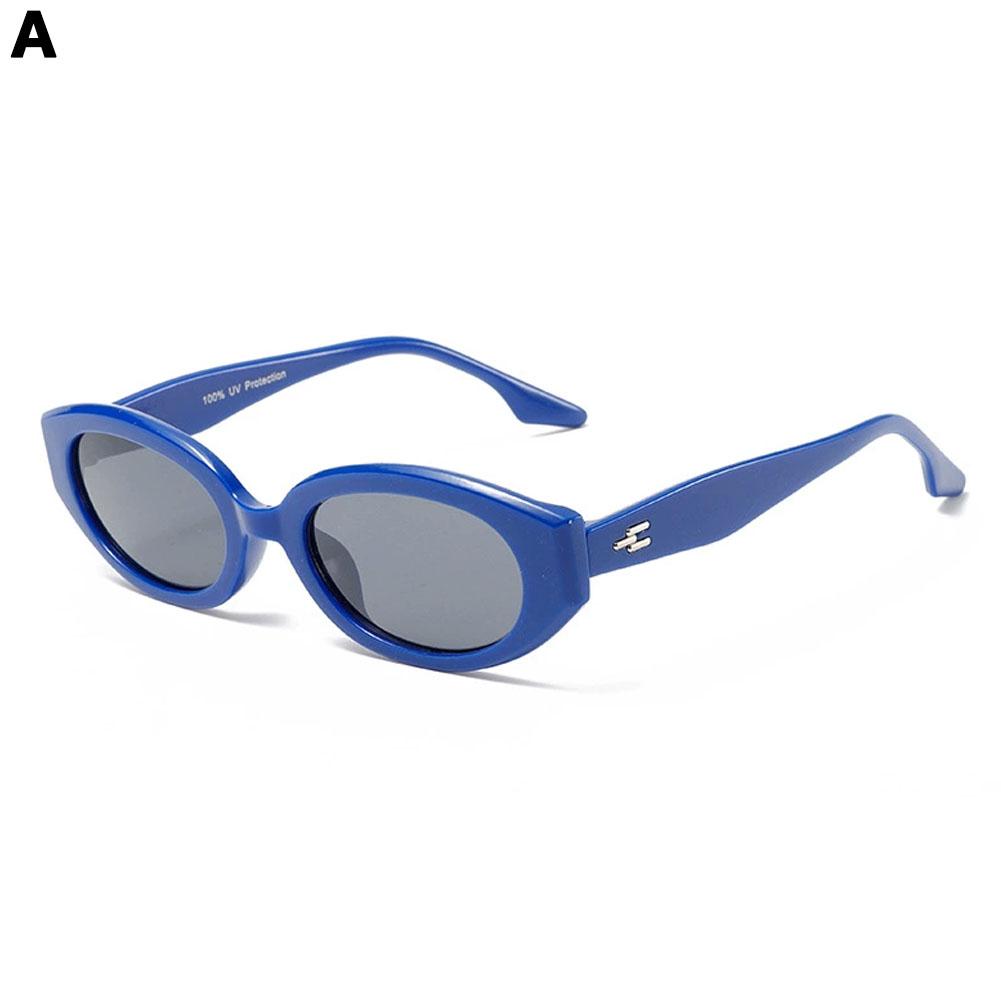 Gafas de sol retro con montura pequeña de ojo de gato para niños y niñas, ideales para actividades al aire libre en la calle.