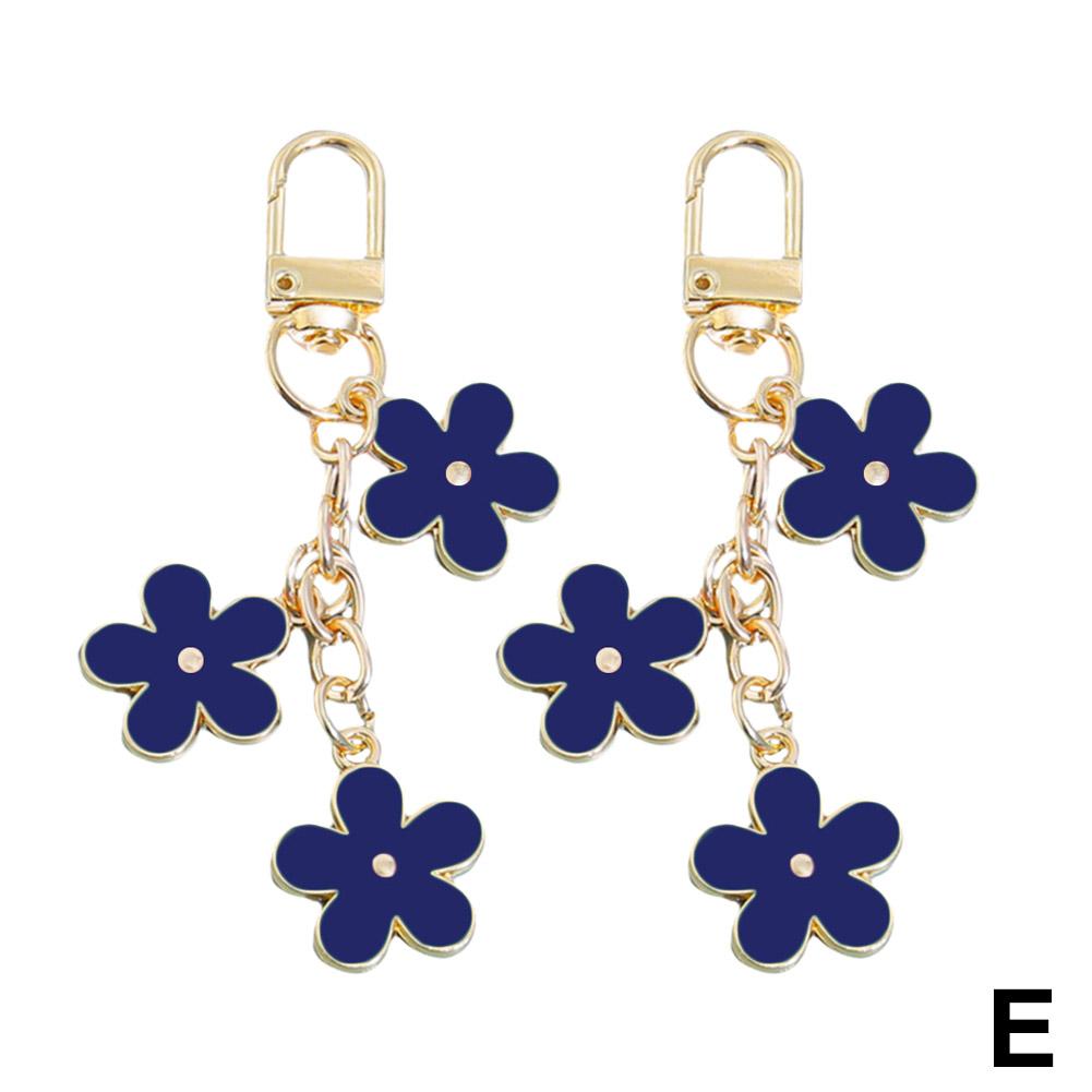 thumbnail image 1 of 2 llaveros de flores de doble cara de colores, de metal, para decorar bolsos y auriculares., 1 of 7
